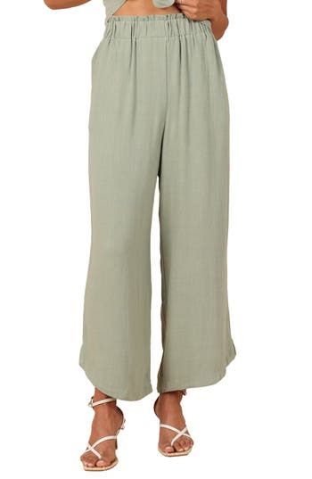 Easy and polished, these elastic-waist pants are crafted from lightweight linen with flowy wide legs. Elastic waist Side pockets Unlined 100% linen Hand wash, dry flat Imported Chic Linen Wide Leg Pants With Pull-on Style, Wide-leg Flax Bottoms For Loungewear, Wide Leg Flax Bottoms For Loungewear, Linen Bottoms With Elastic Waistband In Flax Color, Flax Linen Bottoms With Elastic Waistband, Linen Wide Leg Bottoms With Pull-on Style, Summer Flax Bottoms With Elastic Waistband, Summer Bottoms With Elastic Waistband In Flax Color, Summer Bottoms With Elastic Waistband In Beige