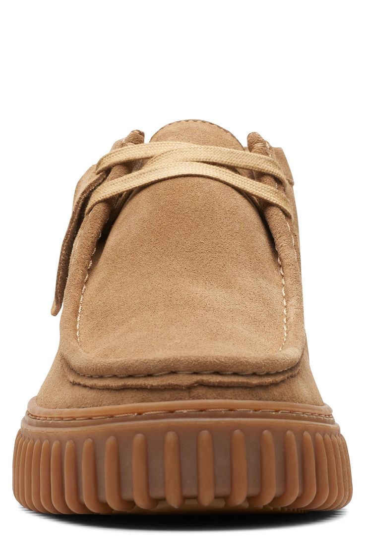 A rib-debossed bumper sole adds rugged detail to a supple suede boot that takes after the iconic Wallabee style with heritage details like skilful topstitching. Removable, cushioned insole with arch support Leather upper and lining/rubber sole Imported Fall Suede Sneakers With Stitched Sole, Casual Desert Boots With Stitched Sole For Outdoor, Casual Brown Desert Boots With Lug Sole, Casual Suede Boots With Plain Toe, Rugged Suede Sneakers With Plain Toe, Suede Sneakers With Textured Sole For Fall, Casual Sneakers With Lug Sole And Plain Toe, Casual Sneakers With Lug Sole Plain Toe, Low-top Suede Desert Boots With Leather Sole