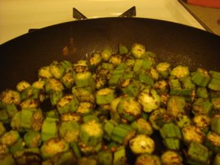 there is a pan full of food cooking on the stove top and it looks like they have been cooked