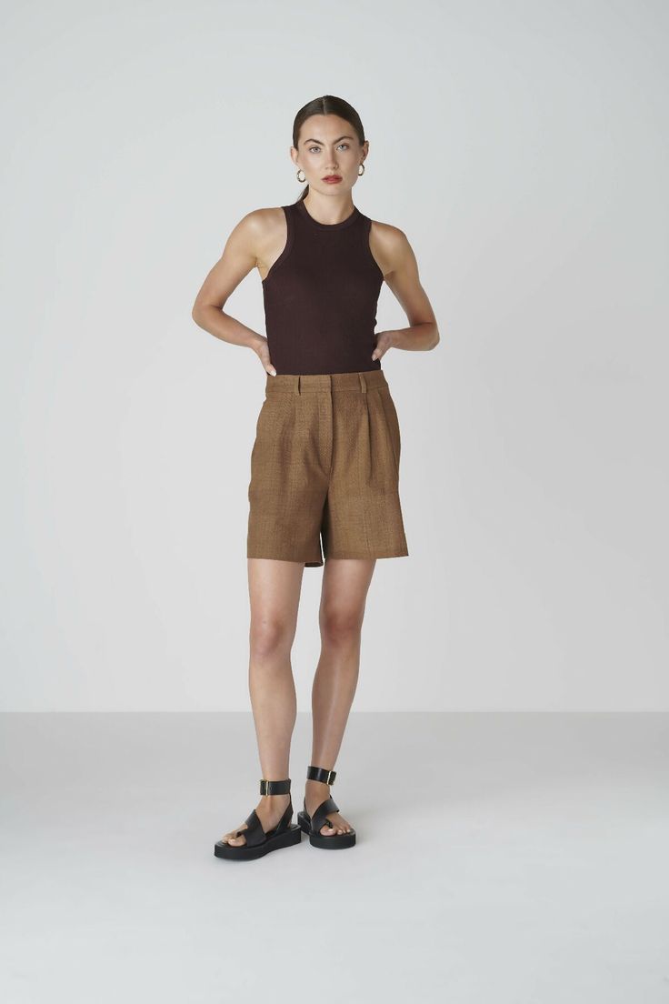 Want to look elegant and show a bit of leg? Discover the Bièl shorts in Cappuccino Brown. These shorts feature a high and slim fit at the waist, with a relaxed fit in the leg. They include a double pleat and two side pockets. The Bièl shorts are perfect for the warmer summer days, but also look stunning in the winter when paired with tights and boots. Complete your look with the matching June Jacket.The fabric is a mix of organic and recycled cotton. The yarns are traditionally plant dyed with b Tights And Boots, Plant Dyes, Comfy Clothes, Cycling Shorts, Dyeing Process, Naturally Dyed, Natural Look, Fashion Labels, Comfy Outfits