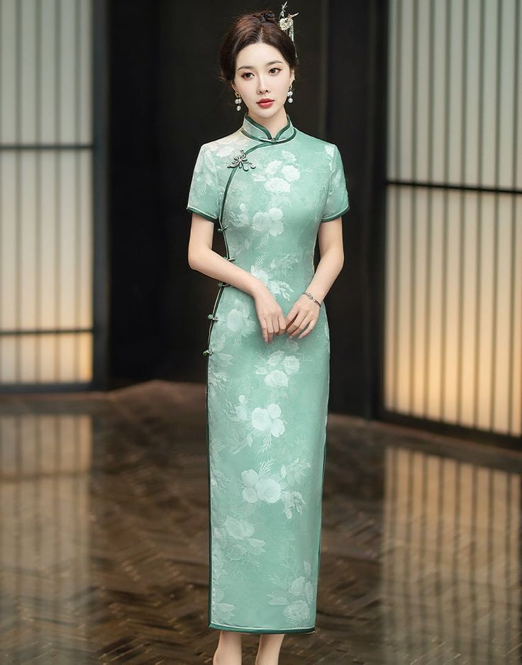 Indulge in the exquisite elegance of this green Cheongsam dress. Featuring a delicate white lisianthus flower print and a traditional mandarin collar, this ankle-length dress is adorned with two subtle side slits, creating a timeless and sophisticated silhouette, perfect for any special occasion. Size Guide: Please refer to the size guide picture before placing the order. Please leave your Height, Weight, Bust, Waist and Hipmeasurements in the Personalisation box so we could double check the siz Green Cheongsam, Lisianthus Flower, White Lisianthus, Qipao Dress, Ankle Length Dress, Cheongsam Dress, Cheongsam, Mandarin Collar, Flower Print