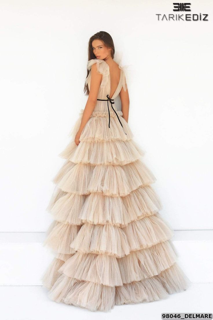 Tarik Ediz Evening Dress Tarik Ediz: 98046 - Delmare Glamorous Tulle Gown With Ruffles, Luxury A-line Evening Dress With Ruffles, Pink Tulle Sleeveless Dress With Ruffles, Tiered Voluminous Tulle Skirt Dress, Luxury Romantic Tulle Ruffle Dress, Beautiful Gown Designs, Ruffle Prom Dress, Prom Dresses Elegant, Kaftan Gown