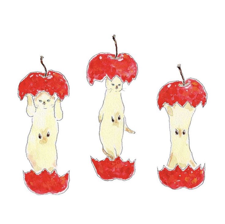 three stickers depicting two dogs with apples on their heads, one in the shape of an apple