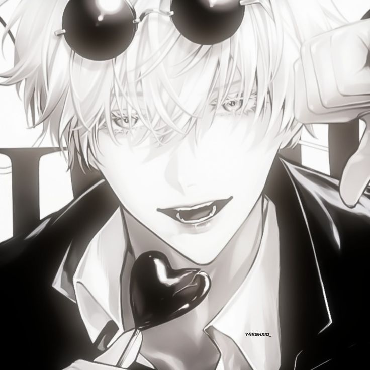 an anime character with heart shaped glasses on his face and one hand up to his head