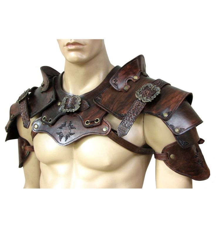 a male mannequin dressed in armor with no shirt on and his chest exposed