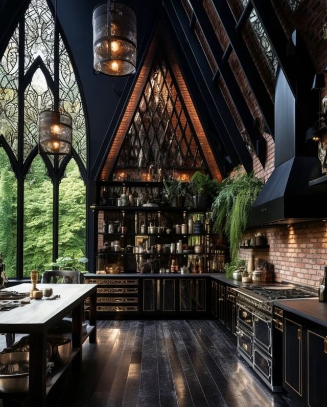 a large kitchen with black cabinets and wooden flooring is pictured in this image from the inside