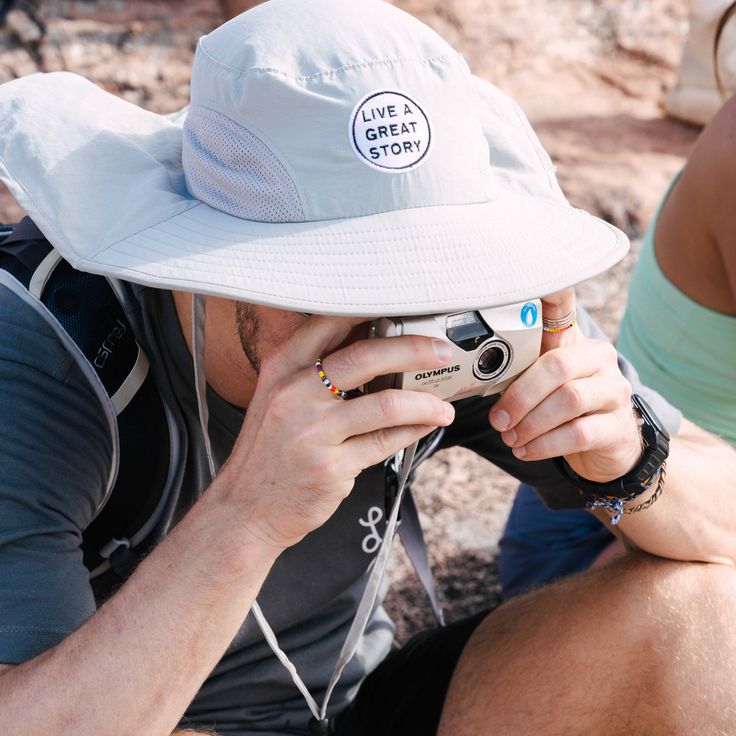 Keep the sun off your neck during your outdoor activities with the useful wide-brim Adventure Hat. Made with a lightweight, breathable SPF fabric with two cinch cord for aggressive conditions, this hat is ready for the next adventure. Functional Outdoor Hat, One Size Fits Most, Functional Brimmed Hiking Hats, One Size Snapback Hat For Adventure, Wide Brim Bucket Hat With Upf 50+ For Hiking, Upf 50+ Brimmed Hats For Hiking, Adventure Hat, Epic Story, Wide Brimmed, Outdoor Activities