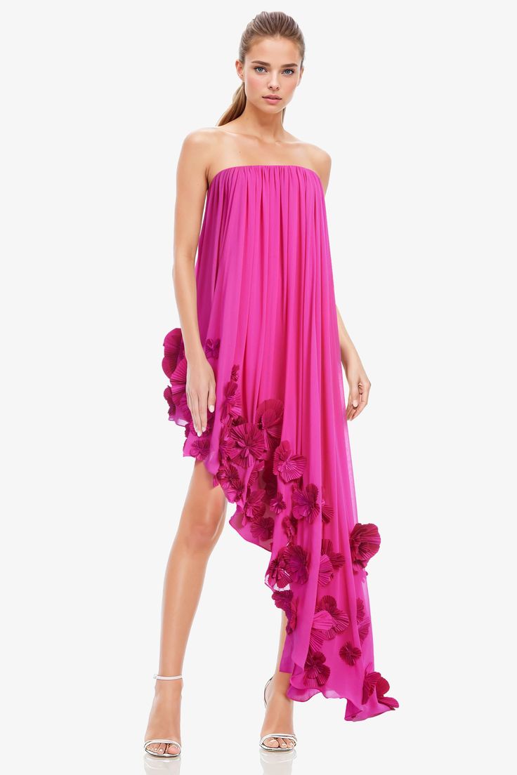 Asymmetrical and high-low? Yes please. This beautiful rich pink maxi gives you the comfort you need and the style you desire with its gathered bust that cascades into a full breezy skirt adorned with 3D rosette flowers on the front hem. Plus, the all-around elastic gummy strapless neckline offers comfort and sizing ease. Pair it with a clutch and heels for warmer weather, and add a jacket if it’s chilly. It works for the day or night, and the floral details on the hem elevate it from ordinary to Pink Pre-draped Maxi Dress For Cocktail, Pre-draped Pink Spring Dress, Pink Draped Maxi Dress For Wedding, Pink Asymmetrical Dress For Gala, Pink Floral Embellished Floor-length Maxi Dress, Pink Floral Embellished Maxi Dress For Parties, Pre-draped Pink Maxi Dress For Gala, Spring Pre-draped Maxi Gown, Pink Chiffon Dress With Asymmetrical Hem