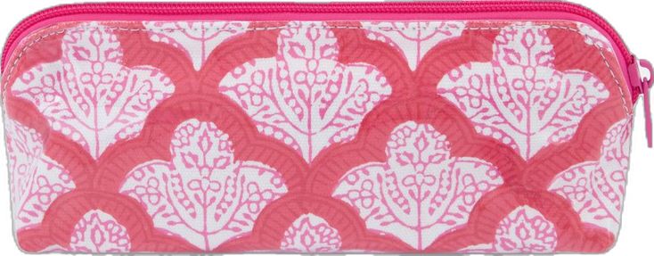 a pink and white purse with hearts on it