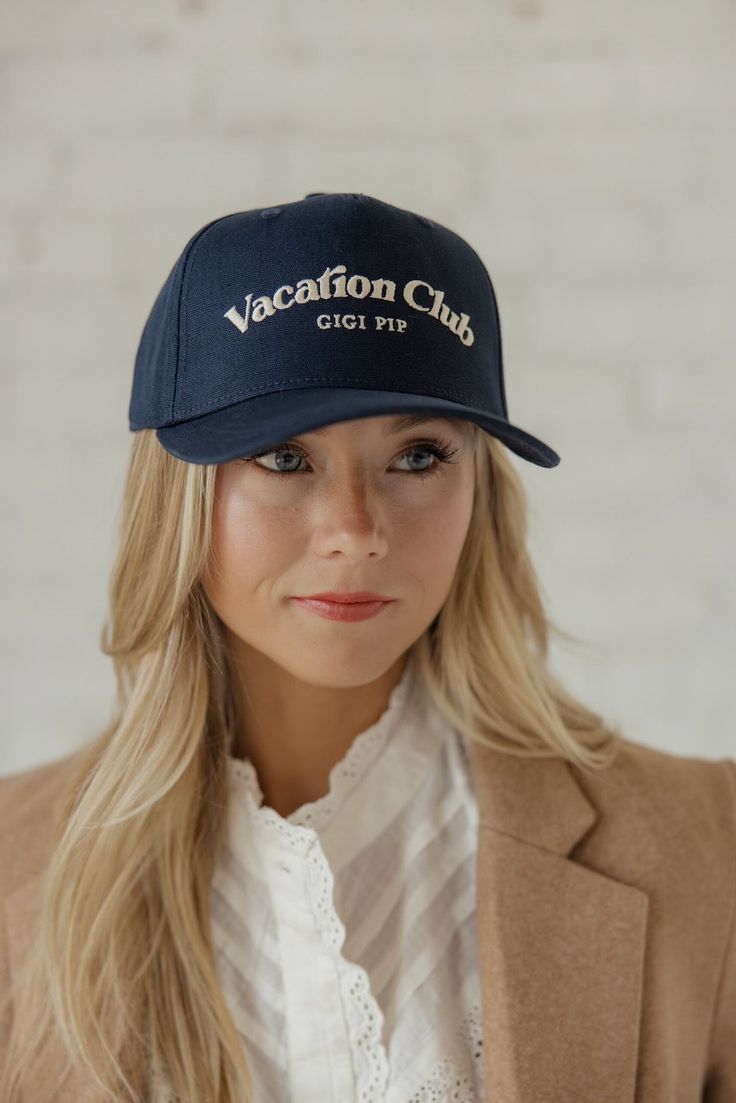 Manifest yourself on a lovely vacation with this cute daily trucker hat. Coming in three neutral colors, you will find one to add to any outfit you choose. 100% cotton canvas w/ a cotton sweatband + a reinforced front panel with 100% polyester mesh embroidered design curved brim medium crown height medium stiffness Trendy Cotton Baseball Cap For Vacation, Everyday Summer Trucker Hat With Flat Bill, Cotton Snapback Trucker Hat For Vacation, Cotton Trucker Hat For Vacation, Adjustable Cotton Trucker Hat For Travel, Casual Cotton Trucker Hat For Vacation, Summer Cotton Trucker Hat With Embroidered Logo, Vacation Snapback Hat With Letter Print, Letter Print Snapback Hat For Vacation