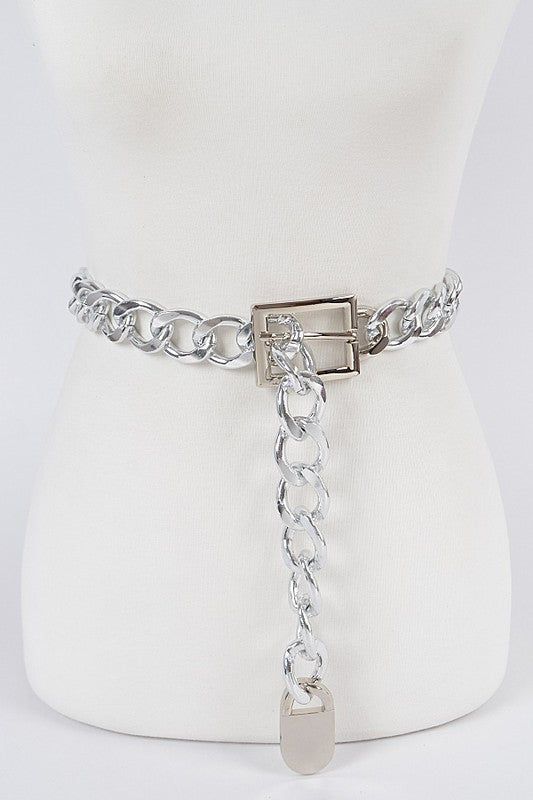 This bold chain link belt adds a touch of edge to any outfit. Its big design makes a statement, while the links add a unique touch. Elevate your look with this confident and chic accessory! Final Sale (note this is made of iron and is slightly heavy and noisy) Approx Width 1” Length 49” Edgy Chain Link Belt With Chain Strap, Adjustable Silver Metal Chain Belt, Edgy Chain Link Belt, Trendy Silver Belt For Party, Trendy Silver Belts For Party, Chic Silver Chain Belt For Party, Trendy Silver Party Belt, Chic Silver Waist Chain, Edgy Silver Chain Belt With Chain Strap