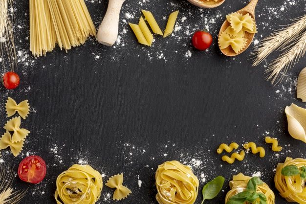 different types of pasta on a black surface