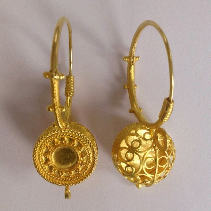 A Replication of Early Medieval Basket Earring in 22 kt yellow gold.ùThe earrings are completely hand made in our atelier in Italy Como with a rigorous quality workmanship .The original earrings dating 6th - 7th century AD are located at the Como Luxury Ceremonial Pierced Earrings, Luxury Ceremonial Yellow Gold Earrings, Luxury Yellow Gold Ceremonial Earrings, Luxury Yellow Gold Earrings For Ceremonial Occasions, Luxury Round Earrings For Ceremonial Occasions, Antique 22k Yellow Gold Earrings, Antique Yellow Gold Ceremonial Earrings, Gold Ceremonial Drop Plug Earrings, Elegant Gold Round Pendant Earrings