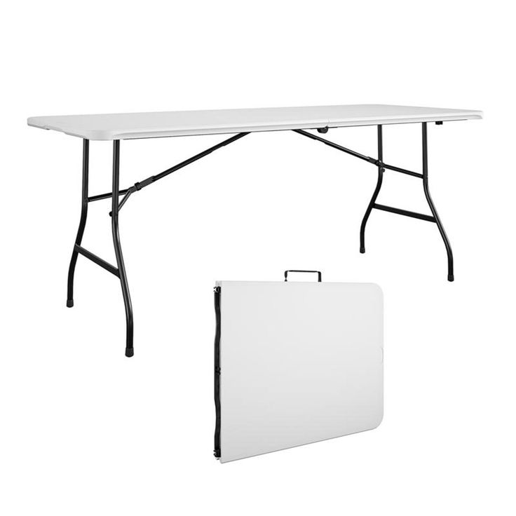 a white table with a black frame next to it