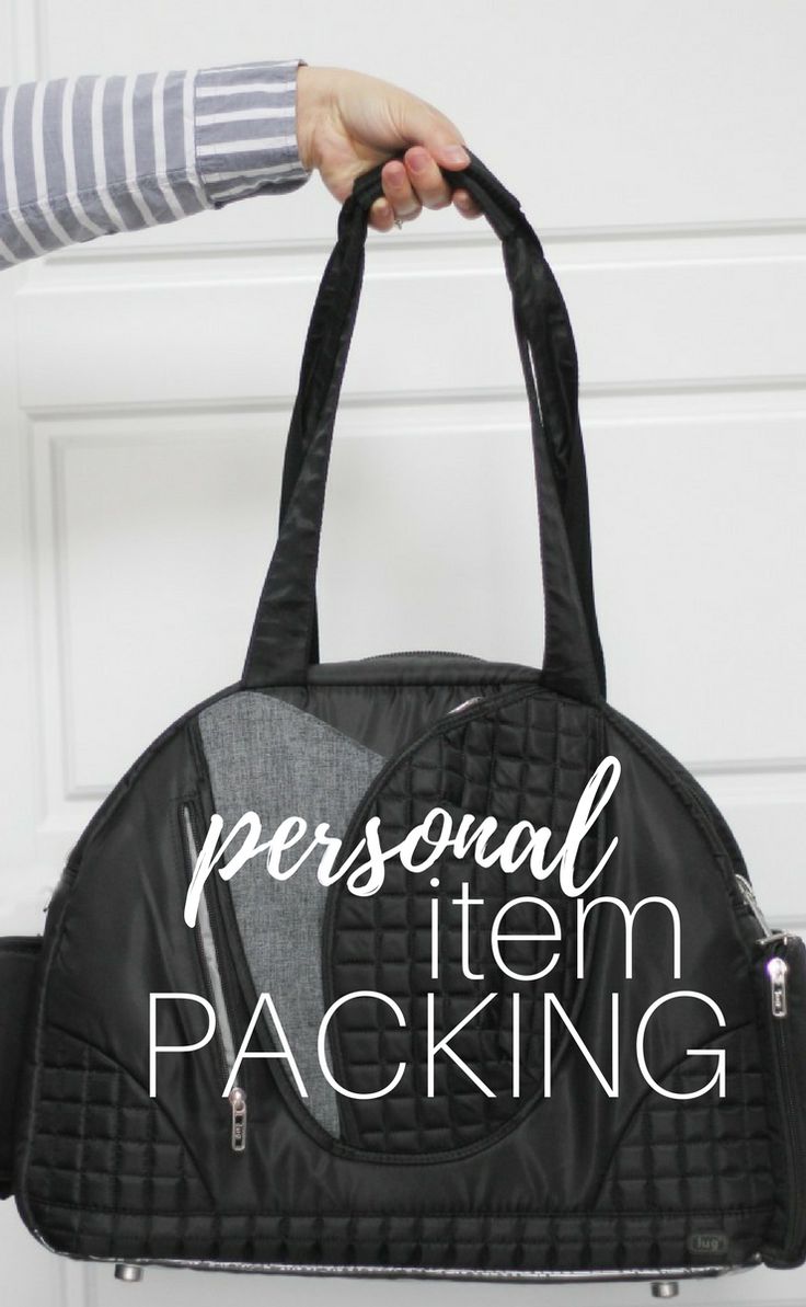 a person holding a black handbag with the words personal item packing in white letters