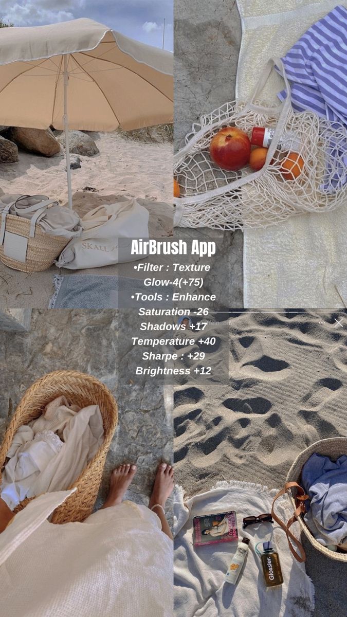 a person laying on top of a sandy beach next to an umbrella and basket filled with fruit