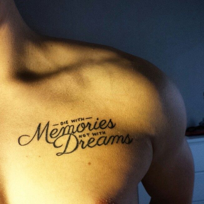 a man's chest with the words memories and dreams tattooed on his left side