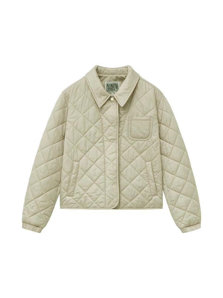 This Women's Quilted Jacket offers a stylish and cozy option for colder days. It features a regular fit with chest pocket details.- Cropped length that makes your look stylish- M+FG metal logo button point for added style- Available in Beige and Navy color options Beige Long Sleeve Quilted Jacket With Pockets, Fall Utility Jacket With Padded Collar For Workwear, Trendy Winter Utility Jacket With Patch Pockets, Classic Fall Puffer Jacket With Pockets, Trendy Khaki Outerwear With Patch Pockets, Trendy Quilted Jacket With Padded Collar, Trendy Quilted Jacket With Padded Collar And Long Sleeves, Fall Utility Quilted Workwear Jacket, Fall Utility Quilted Jacket For Work