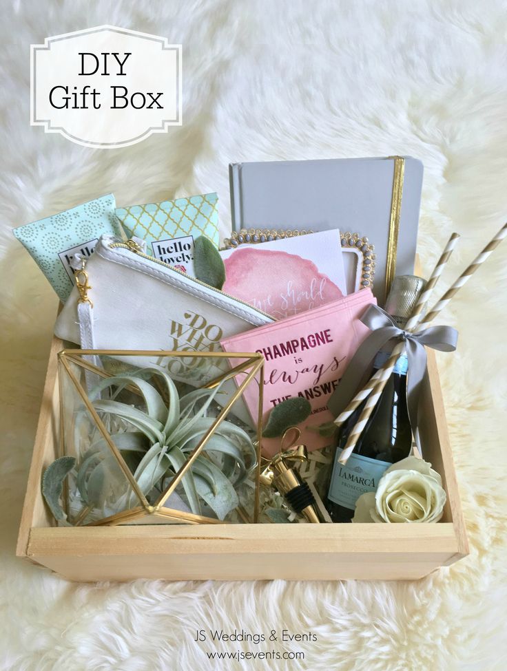 the diy gift box is filled with various items