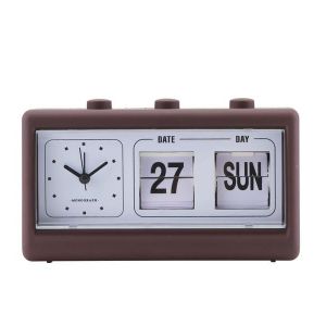 an alarm clock with the date and time displayed on it's display unit, brown