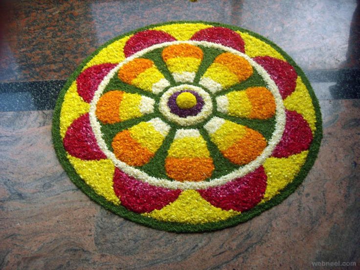 a colorful flower design is on the floor