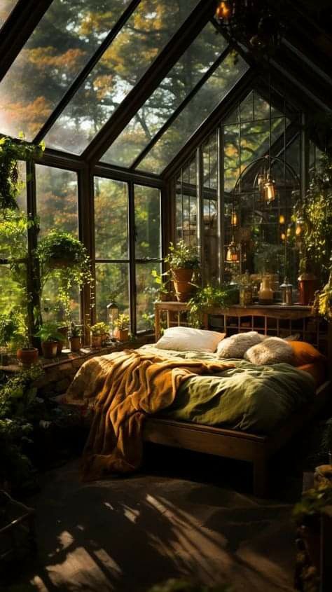 a bed in a room with lots of plants