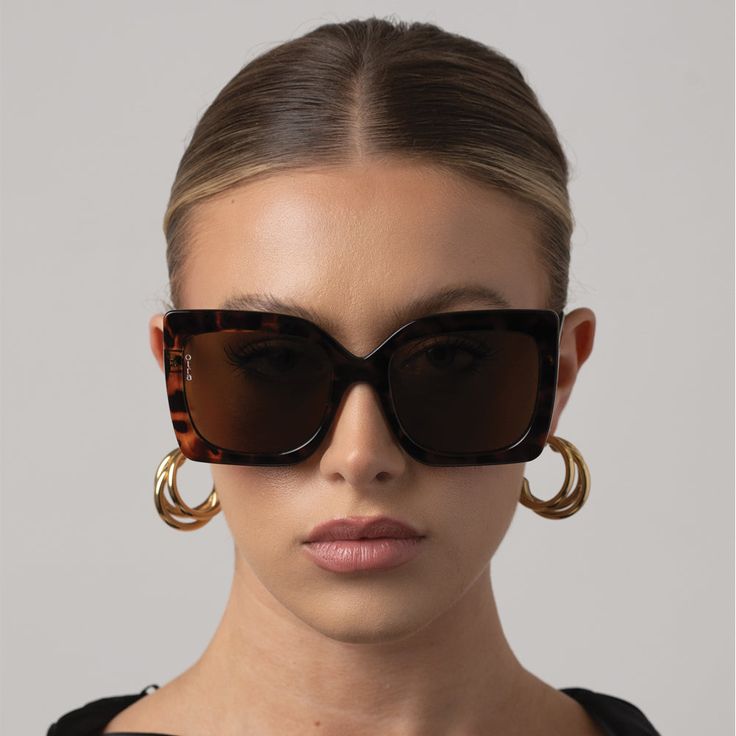 Protect your eyes in style with Dynasty Sunglasses. With an oversized squared frame shape and tortoiseshell color, these sunglasses not only provide 100% UV protection, but also elevate your look. The brown lenses, categorized as level 3, offer a clear view while shielding your eyes from harmful rays. Frame Shape: Oversized Squared Frame Color: Tortoiseshell Lens Color: Brown, Lens Category 3 100% UV Protection *Available at both locations As Level, Brown Lens, Level 3, Clear View, Elevate Your Look, Tortoise Shell, Your Eyes, Uv Protection, Lenses