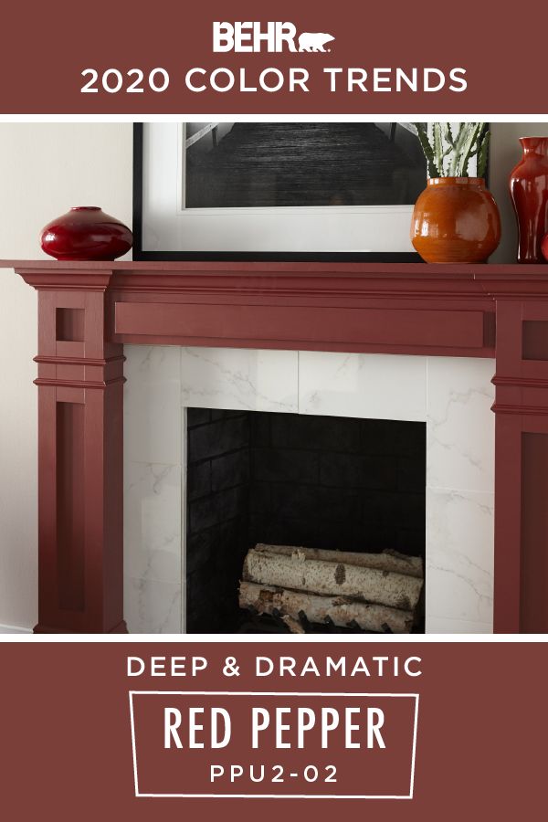 a red and white fireplace with the words behrr color trend