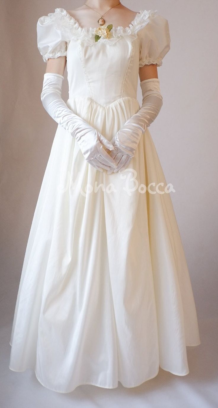 Ivory cream dress for a young lady, debutante for any Victorian ball, Victorian soiree. The dress is made with beautiful ivory polyester taffeta and cream laces and flowers. The dress can be worn with a separate petticoat ( pictured with a one layer petticoat that can be purchased separately). Gloves are not included with the dress and can be purchased separately. Made to order - leading time 4-6 weeks depending on my order book. Please see the sizing guide here https://www.etsy.com/uk/listing/4 Victorian Debutante, 1800 Dresses Victorian, 1800 Dresses, Ice Dresses, Soiree Dress, Gibson Girl, Blouse Hand Designs, Dress Pin, The Opera