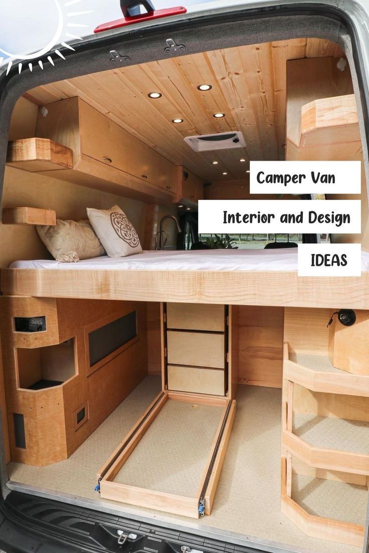 the inside of a camper van with its bed and storage compartments open to show what's inside