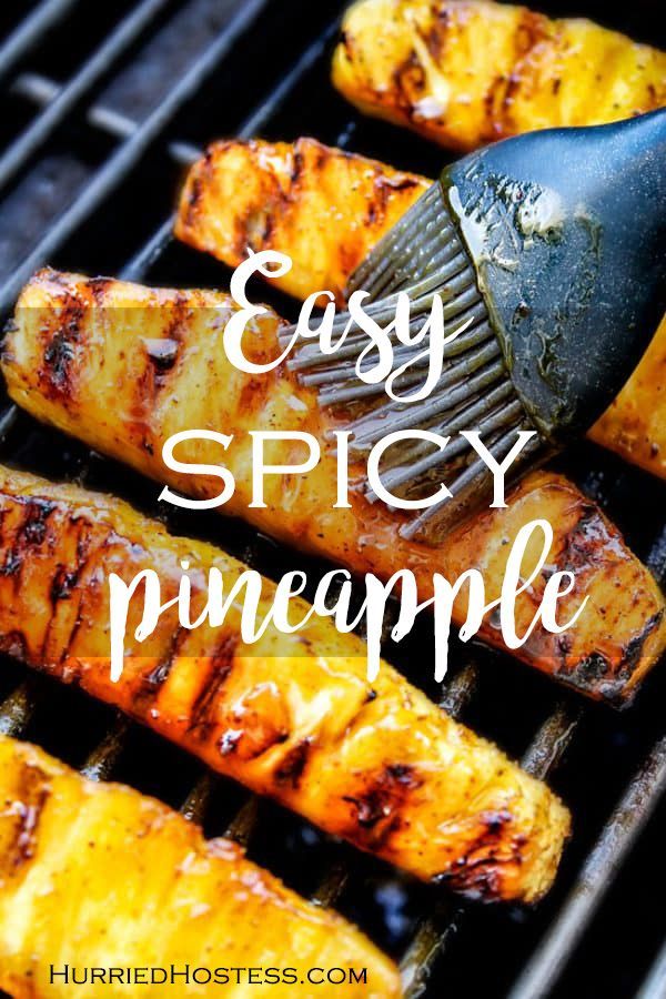 grilled pineapples with the words easy spicy pineapple on top and an oven brush