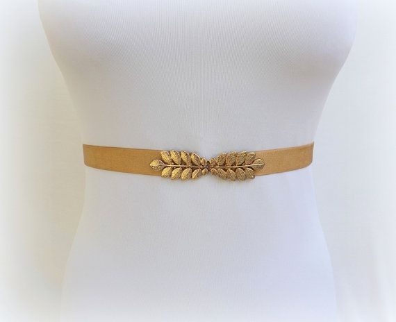 Gold leaf belt. Elastic waist belt. Dress belt. Stretch belt. Grecian belt. Wedding belt. Bridal belt. Greek belt. Bridesmaids belt. ❤ Sizes:  XS-S: fits to waist size from 27 to 29 (67cm - 72cm)  M-L: fits to waist size from 29 to 31 (72cm - 77cm)  XL: fits to waist size from 31 to 33 (77cm - 82cm)  Custom Size: If youre not sure about size or need a different size please write your waist measurement in the message box at checkout and Ill fit the belt to the requested size with no additional... Gold Fitted Belt, Elegant Adjustable Chain Belt For Summer, Adjustable Gold Belt For Summer, Gold Adjustable Belt For Summer, Adjustable Gold Fabric Belt, Gold Fitted Belt For Formal Occasions, Elegant Rope Belt For Spring, Gold Adjustable Belt For Spring, Formal Fitted Gold Belt