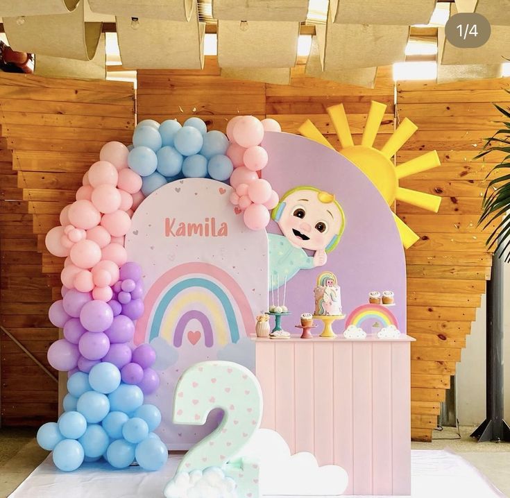 a birthday party with balloons and decorations