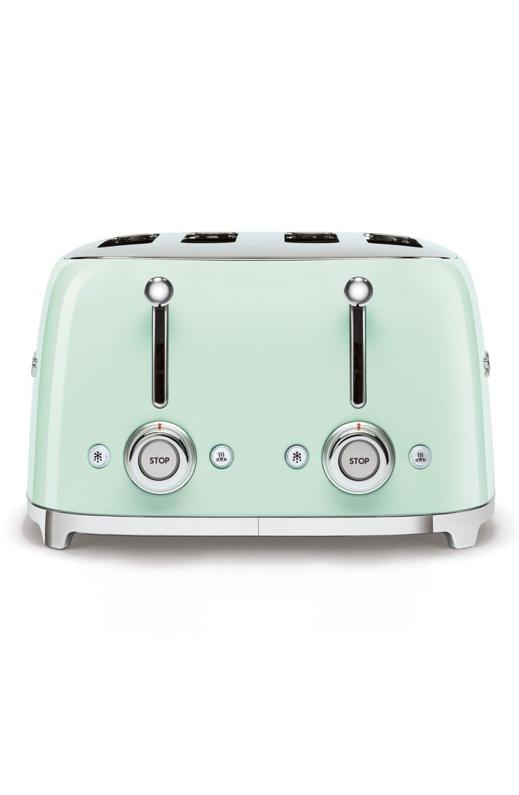 a blue toaster sitting on top of a white table