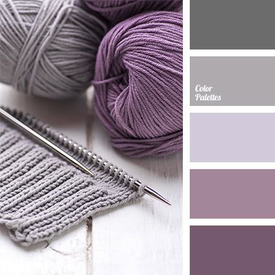 yarn and knitting needles with color swatches