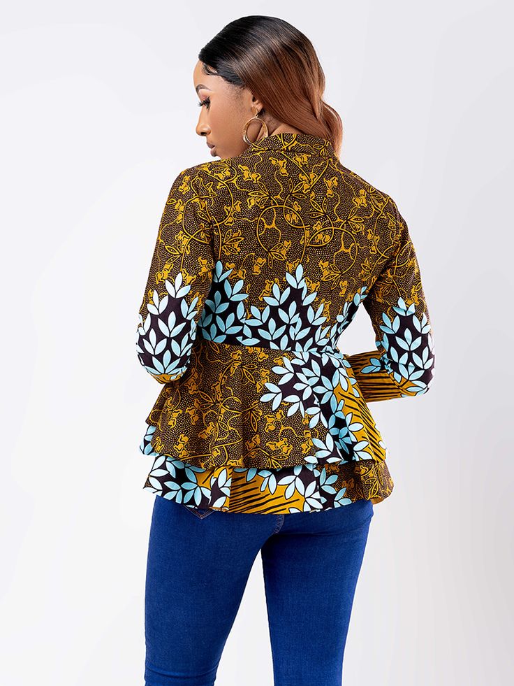 Add some color and style to your wardrobe with your Bamako Single Button Peplum Jacket. This Ankara fabric master piece is sewn with skill and artistry, featuring a flattering sleek peplum silhouette at the waist to accentuate your figure. This jacket will pair well with your favorite jeans or over a chic dress. Description 100% Cotton African Print Wax Long sleeves Pleated Peplum Cross button Lapel collar and detachable belt Fully lined for added comfort Medium Length of top is 25 inches Sleeve Fall Peplum Top For Workwear, Fall Season Peplum Top For Workwear, Fall Workwear Peplum Top, Fall Peplum Top For Work, Master Piece, Peplum Jacket, Ankara Fabric, Button Jacket, The Roots