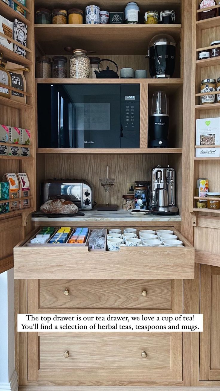 an open cupboard with some food in it and a message on the bottom right corner