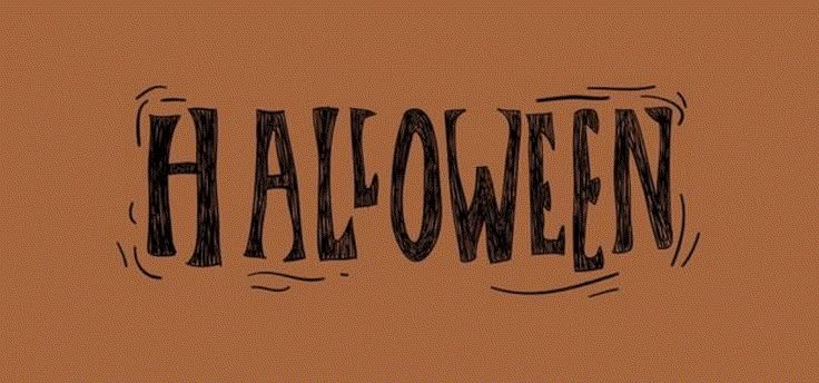 the word halloween written in black ink on a brown background