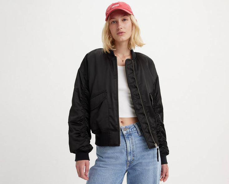 With its bomber jacket look, middle zip-up front, oversized flap pockets and ribbed cuffs and hem, this Andy Tech Jacket will be a mainstay in your closet for years to come. A mid-zip jacket staple Cut with a standard fit Features oversized flap pockets Finished with ribbed cuffs and hem Crafted with warm synthetic fill Levi's Black Spring Outerwear, Classic Black Levi's Outerwear, Levi's Black Winter Outerwear, Levi's Black Outerwear With Pockets, Womens Levi Trucker Jacket, Womens White Jeans, Black Levis, Best Jeans For Women, Best Jeans