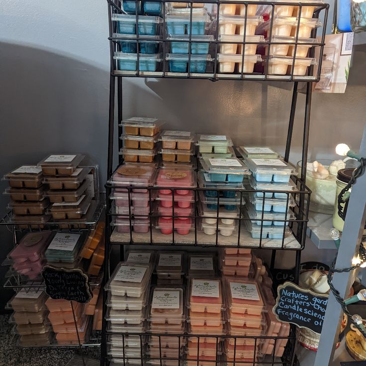 a display case filled with lots of different types of cakes