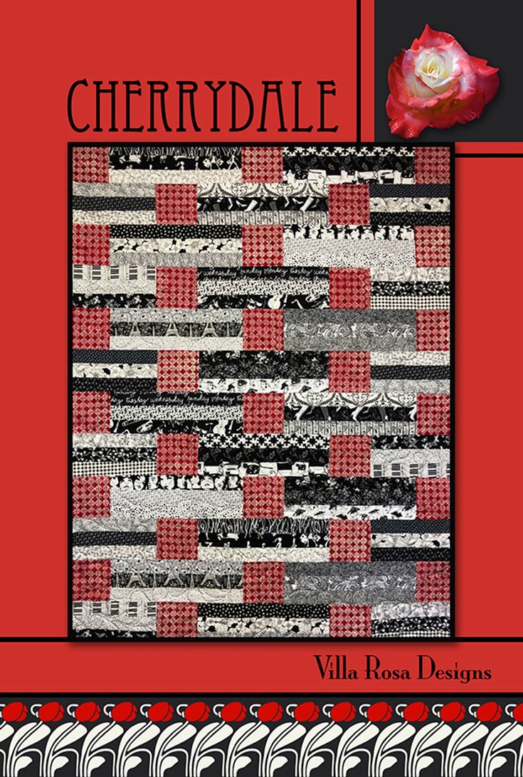 a red and black quilt with the words cherrydale on it