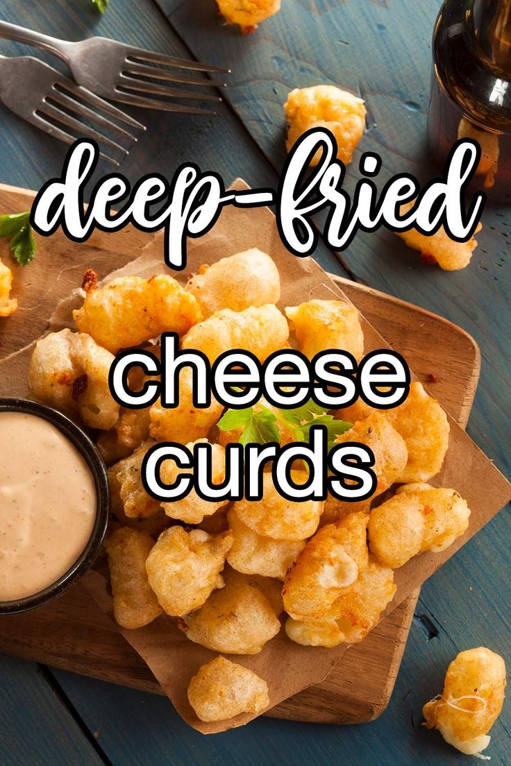 deep fried cheese curls with dipping sauce on the side