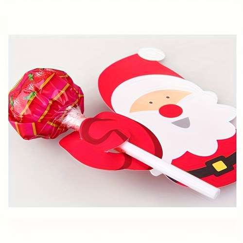 a candy box with santa clause on it and a lollipop in the shape of a heart