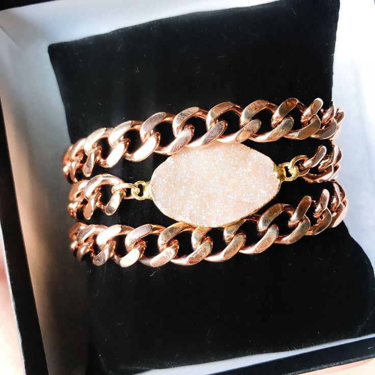 Lulu bracelet in rose gold featuring XL rose gold chain, thicker than the rest, and a small druzy stone. Available in other colors as well. Chain is rose gold plated and has a shiny finish. Features tiny crystal gemstone on the end and lobster clasp. We can customize to fit your wrist! Stones are set in 24kt gold and silver. Please send us your wrist measurement via email after purchasing! Please note, this chain is about twice as thick as the chain in the signature 'Leesa' style bracelet. Rose Gold Metal Crystal Bracelet For Party, Adjustable Rose Gold Bracelet With Gold Chain, Rose Gold Adjustable Chain Bracelet For Party, Rose Gold Bracelets With Adjustable Chain For Party, Rose Gold Chain, 24kt Gold, Blue Stone, Crystals And Gemstones, Gold And Silver