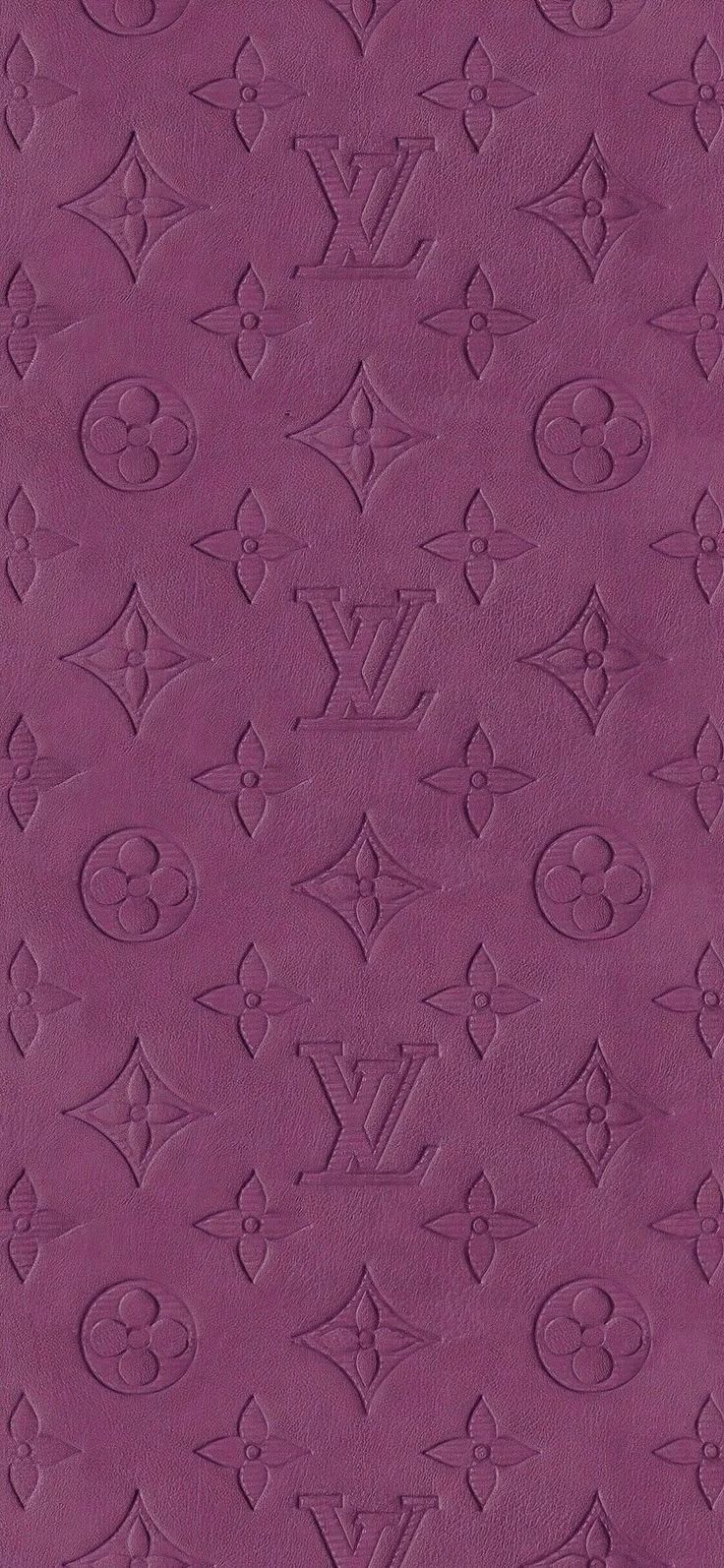 an image of a purple wallpaper with monograms on the bottom and sides