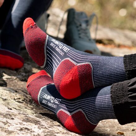 To keep our feet happy on thru-hikes, we armor them with Farm To Feet's Damascus 3/4 Crew Sock. The stretchy merino-nylon blend holds strong as it regulates the temp of our feet, keeping them warm on crisp mornings and cool on balmy afternoons. Equipped with ventilation channels and padding in high-impact areas, this pair fights off fatigue and moisture throughout our double-digit days. Breathable Winter Outdoor Socks, Functional Breathable Socks For Outdoor, Breathable Functional Socks For Outdoor, Breathable Functional Outdoor Socks, Sporty Anti-odor Socks For Outdoor, Anti-odor Winter Socks For Outdoor Activities, Winter Anti-odor Socks For Outdoor Activities, Anti-odor Socks For Winter Outdoor Activities, Comfortable Anti-odor Socks For Outdoor