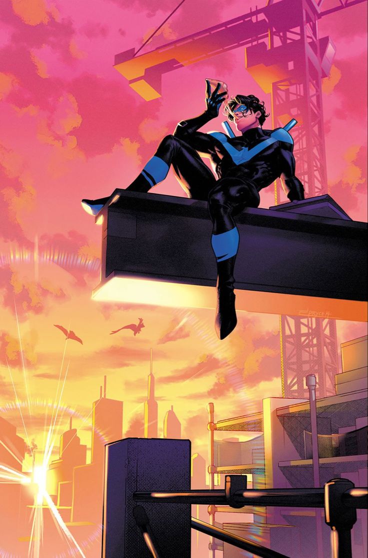 a man flying through the air while riding on top of a building under a pink sky