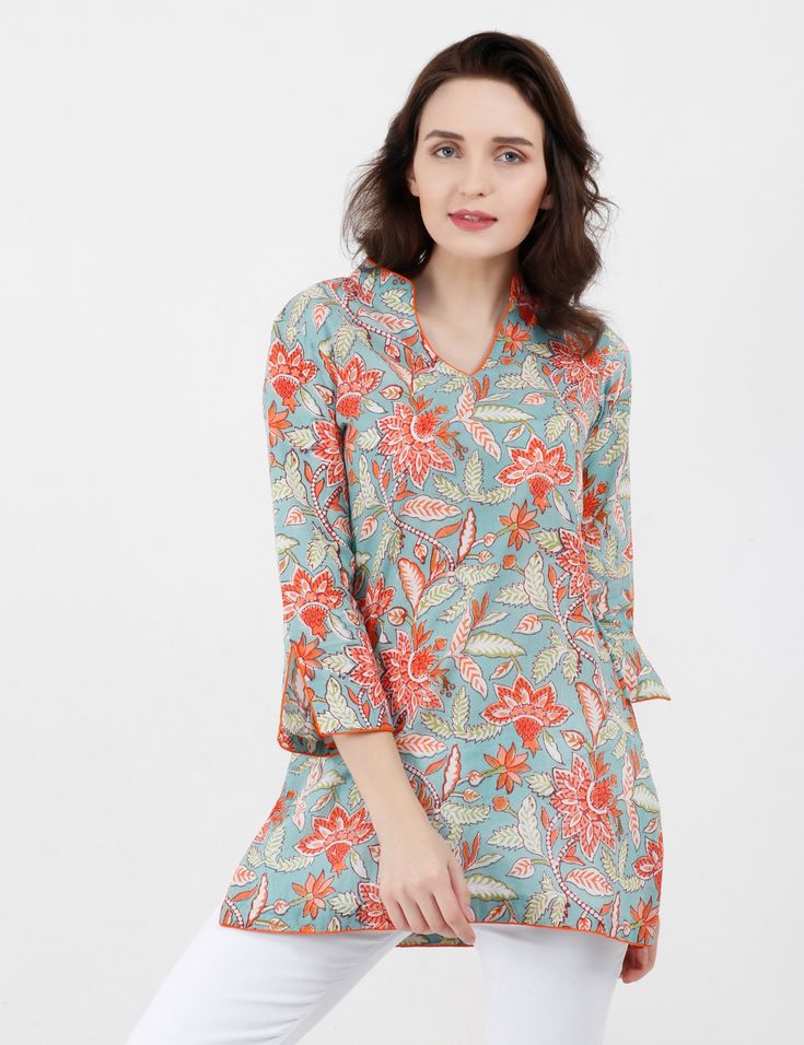 Bring cheerfulness with the hand-block printed floral tunic, which is so easy to dress up or down, and transitions well through the seasons. 100% Cotton 3/4 Slit Sleeves Mandarin Collar Side Slits Contrast Piping Hand-Block Printing Slim Fit For Regular Fit, Go a Size Up Dry Clean Only Blue Green Palette, Green Palette, Floral Tunic Tops, Trendy Tops For Women, Delicate Flowers, Loafers Shoes, Floral Tunic, Contrast Piping, Trendy Tops