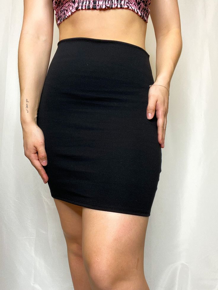 No matter the vibe, the Simple Joys Black Bodycon High Waisted Skirt knows how to show you off! Medium-weight woven fabric shapes this high-rise silhouette and figure-hugging design. This skirt will go with any type of top, giving you unlimited options! 73% nylon, 24% rayon, 3% spandex Hand wash cold, hang to dry Runs small, we recommend sizing up Unlined Model Information: Height: 5'6" Bust: 32" Waist: 28" Hips: 40" Wearing: Large Solid Bodycon Casual Bottoms, Solid Color Casual Bodycon Bottoms, Casual Solid Color Bodycon Bottoms, Fitted High Waist Black Mini Skirt, Black High Waist Bodycon Bottoms, Black Bodycon High-waisted Bottoms, Casual Black Mini Skirt Hip-length, Casual High Waist Bodycon Bottoms, Casual Black Hip-length Mini Skirt