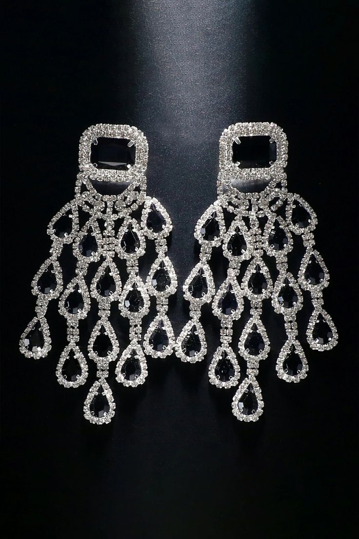 Elevate your style with our Diamond Floral Fringe Earrings. These stunning earrings showcase intricate diamond-encrusted floral designs with delicate fringe details. The combination of diamonds and cascading fringes adds a touch of sophistication and movement, making them a perfect accessory for special occasions. Embrace a look that effortlessly blends luxury and trendiness with these captivating earrings. Diamond Dangle Bridal Earrings For Party, Diamond White Crystal Chandelier Earrings, Diamond White Dangle Earrings For Party, Diamond White Crystal Chandelier Dangle Earrings, Diamond White Sparkling Chandelier Earrings For Party, Sparkling Diamond White Chandelier Earrings For Party, Diamond White Dangle Bridal Earrings For Party, Glamorous Tassel Earrings For Wedding, Diamond White Chandelier Earrings With Sparkling Stones For Evening